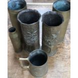 Shell casings from 1917-1970, including two Trench Art 1917 German Haniel & Lueg shell cases with