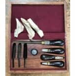 Gun Cleaning Kit in mahogany box 20th Century.