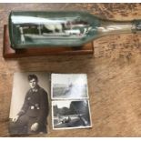 German WWII POW ship in bottle of a hospital ship sailing in a German landscape with pictures of the