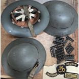 Three WW2 Helmets, MK4 303 ammunition clips and cloth shoulder flashes for WW2 Fire & Rescue