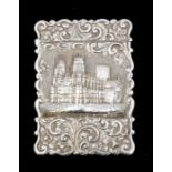 A Victorian silver card case, the front chased with York Minster in high relief on matted background
