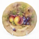 A Royal Worcester side plate, painted with fruiting vines and peaches, signed H. Ayrton, date code