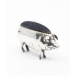 An Edwardian large silver pin cushion in the form of a Pig, hallmarked by Cornelius Desormeaux