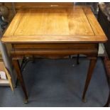 An Edwardian mahogany square card table, satinwood batwing patera and stringing, oversailing top