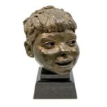 Sir Jacob Epstein (British, 1880-1959) Portrait of a Young Boy, bronze, signed, approx 23cm high, on