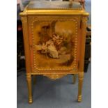 A French Louis XVI revival gilt sheet music cabinet, painted rectangular top above a single door,