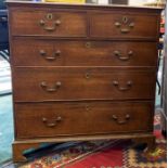 A  19th century oak chest of drawers, moulded slightly oversailing top, above two short and three