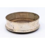 A Modern plain silver wine coaster, turned wooden base, engraved with initials, hallmarked by DR &
