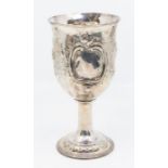 A George III silver large goblet, the body chased with a central band of flowers and foliage, vacant