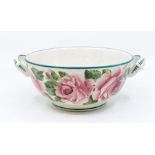 An early 20th Century Wemyss ware sponge bowl, the body decorated with pink cabbage roses, stamped