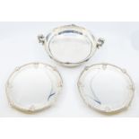 A George VI silver three piece garniture comprising two handled bowl and a pair of tazze, the