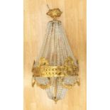 A pair of 20th Century chandeliers, gilt metal with crystal details, approx 105cm; together with a