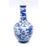 A Chinese blue and white 'nine' dragon bottle vase, Jiaqing mark and period (1796-11820), the