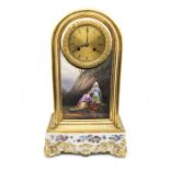 A French 19th Century porcelain mantle clock, with brass dial Roman numerals signed Raingo Freres
