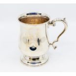A George VI silver large baluster mug, monogrammed and engraved to underside dated 1931,