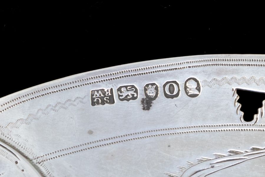 A George III silver oval bright cut engraved fish slice, the blade hallmarked by Samuel - Image 2 of 2