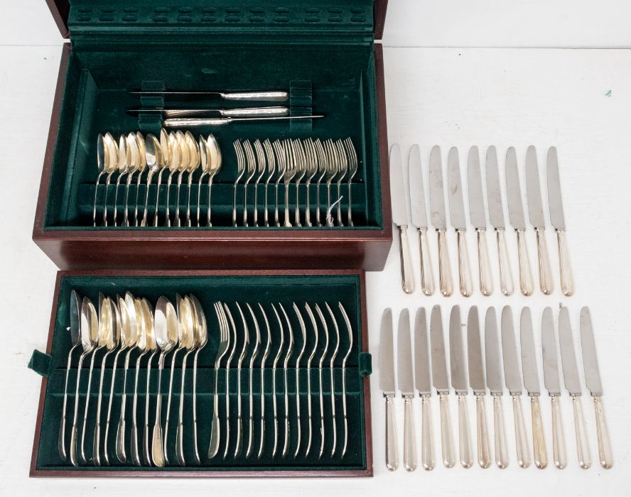 An Edwardian twelve piece silver fiddle and thread pattern flatware service, hallmarked by William