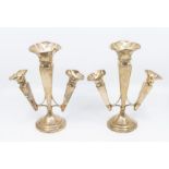 A pair of George V silver epergne vases, trumpet shaped with flared rims, central section flanked by