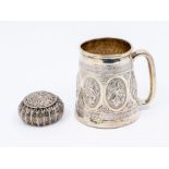 An Asian silver probably 800 standard tapering mug, the sides chased with ornate oval panels with