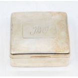 An early 20th Century plain rectangular silver ring (cigarette) box, the cover engraved with