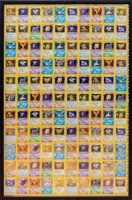 Pokemon: A framed and glazed uncut printers sheet of Pokemon Fossil holographic cards, one of only