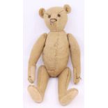 Steiff: An early 20th century humpback Steiff bear, with pointed nose, shoe button eyes, straw