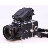 Hasselblad: A Hasselblad 503CX, Medium Format Camera, Serial No. RE 1428680, complete with three