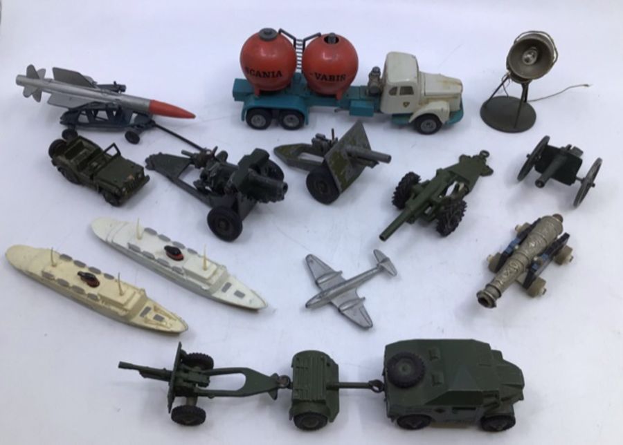 Diecast: A collection of assorted diecast vehicles to include Dinky and Britains military. Please