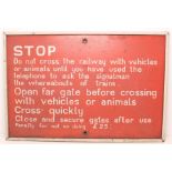 Railwayana: A 20th century enamelled railway sign: 'Beware of Trains in Motion When These Bells