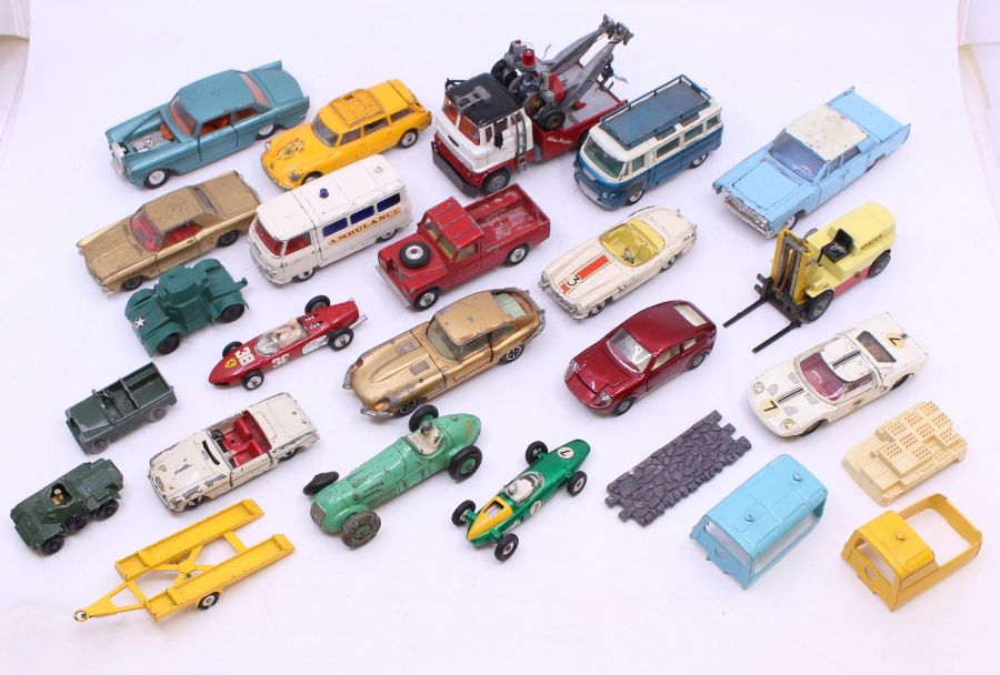 Corgi: A collection of assorted playworn, diecast Corgi vehicles, mostly vintage, approx. 15