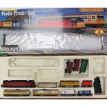 Hornby: A boxed Hornby OO Gauge, Twin Train Set, R346; together with another boxed Hornby OO