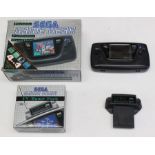 Sega: A boxed Sega Game Gear Portable, Full Colour, handheld console; together with a boxed Sega