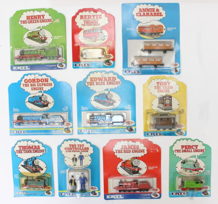 ERTL: A collection of assorted Thomas the Tank Engine & Friends carded items to include: Henry,