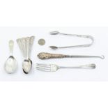 A collection of silver flatware to include: George V caddy spoon, hallmarked by Turner & Simpson,