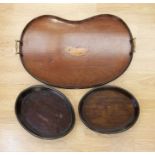 Edwardian kidney shaped butlers tray with shell inlay along with two mahogany coasters with brass