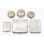 A collection of early 20th Century silver to include two various cigarette cases and a two