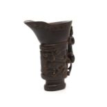 A carved horn cup