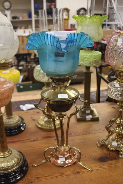 A rare late 19th Century Art Nouveau Arts and Crafts messengers lamp, brass and copper, with blue