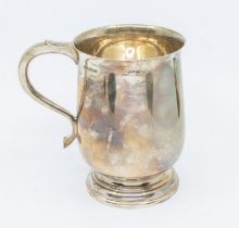 A George VI large silver plain baluster tankard, hallmarked by Finnegans, Sheffield, 1939, stamped