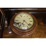 Small late 19th Century round oak wall clock with Roman numerals