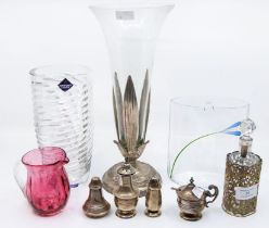 A silver three piece cruet; a silver pepperette; glass bottle with EP pierced sleeve; a plated and