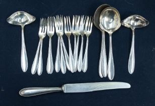 A Modern 12 piece Nirosta WMF flatware service, to include: Table knives & forks, dessert spoons &