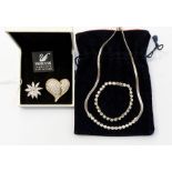 A collection of Swarovski jewellery to include a line necklace set with round crystals to the