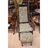 A rocking chair and footstool