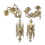 A pair of Victorian brass wall lights, Gothic Revival plates with detachable scrolling three light