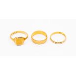 Two 22ct gold bands, widths approx 5mm and 2mm, sizes Q and P1/2, combined weight approx 6.9gms