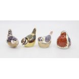 Four boxed Royal Crown Derby paperweights with gold stoppers: the robin, blue tit, wren and