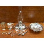 A collection of 18th Century silver teaspoons, a sugar nippers and an Edwardian silver gilt