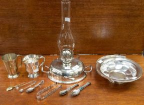 A collection of 18th Century silver teaspoons, a sugar nippers and an Edwardian silver gilt