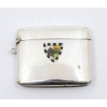 A George V silver and enamel vesta case with crest for Gonville & Caius College, Cambridge by